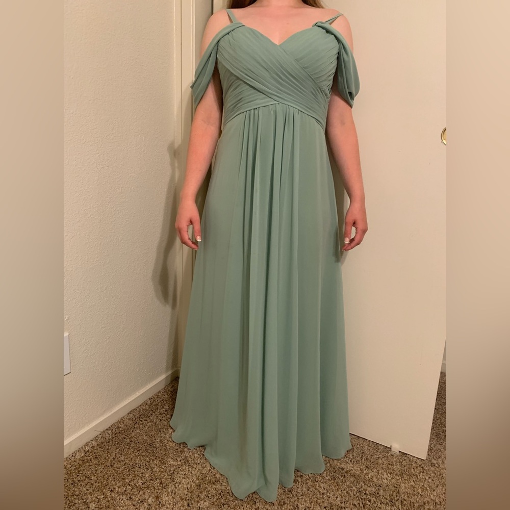 Light green bridesmaid dress. Off the shoulder with corset back.